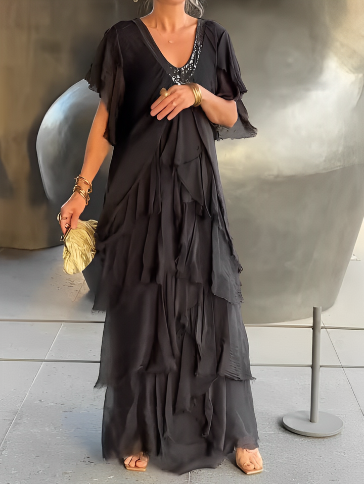 Bronisława – Zwiewna sukienka maxi z artystycznym akcentem