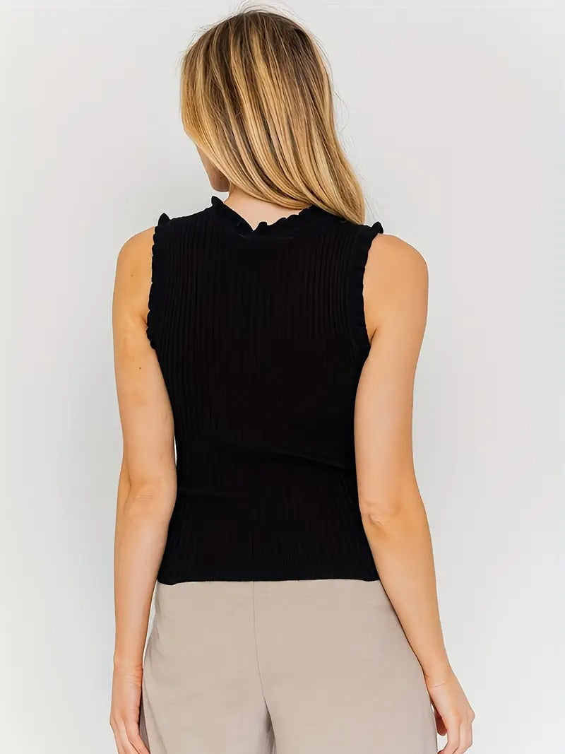 Evania – Elegancki top z falbanką i połyskiem